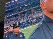 Officers Bridges and Olvera particpate in 9/11 ceremonies at Cowboy Stadium