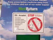 A close up shot of the instructions that adorns the drug collection container where drugs are deposited